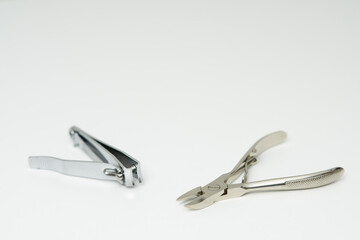 Two types of nail clippers plier type and compound lever type