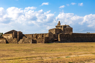 Ruins of the monastery, the town, and the ancient medieval walls of Roses, Spain, inside the citadel