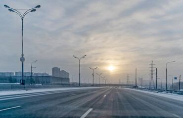 On the morning of the first of January, there are few cars on the highway