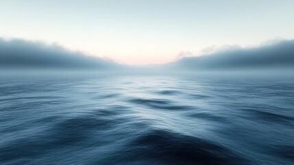 Obraz premium Gentle waves ripple across the calm ocean at dawn, shrouded in misty tranquility