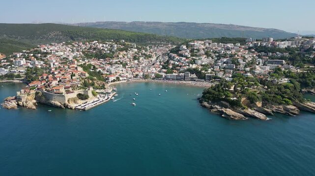 Panoramic drone view of Ulcinj city in Montenegro and Ulcinj central beach