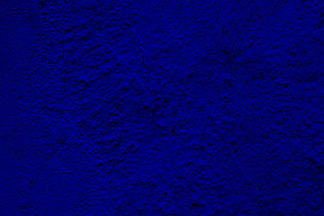 Blue colored abstract wall background with textures of different shades of blue