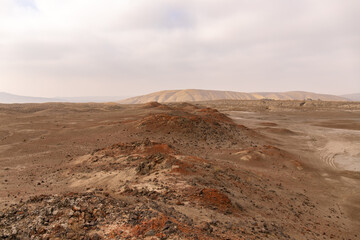 Burnt volcanic rock near the mud volcanoes near the village of Alyat.  Azerbaijan.