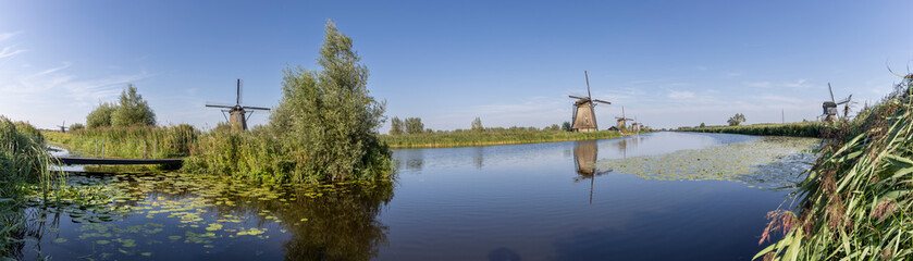 Panoramic shot of the historic windmills at Kinderdijk in the Netherlands
