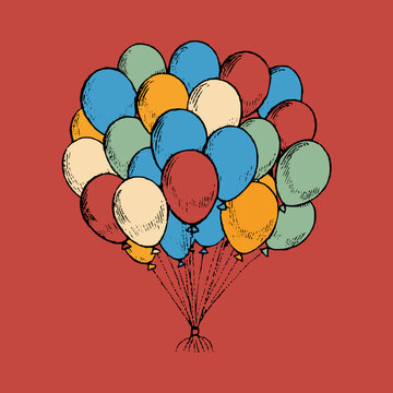 A vibrant bunch of colorful balloons in various shades, including red, blue, green, and yellow, floating together against a light blue background. Ideal for celebrations, parties, and festive occasion