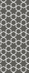 A geometric pattern featuring interlocking shapes in white on a dark background, suitable for backgrounds or textile designs.