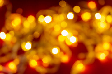 Obraz premium Bright festive orange blurred background with bokeh