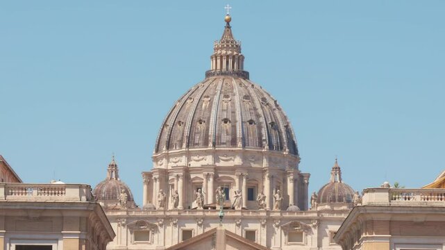 Admire the majestic dome of St. Peter's Basilica glowing under the bright Roman sun