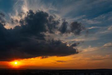 Colourful landscape of beautiful sunset or sunrise with cloudy sky. Natural abstract background.