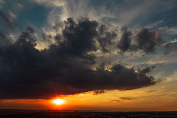 Colourful landscape of beautiful sunset or sunrise with cloudy sky. Natural abstract background.