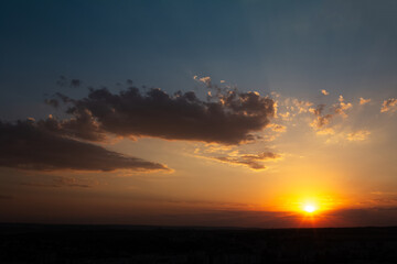 Colourful landscape of beautiful sunset or sunrise with cloudy sky. Natural abstract background.