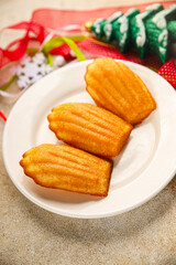 Madeleine, sweet biscuit dessert Christmas cookie delicious Christmas treat Fresh delicious gourmet food background on the table rustic food top view copy space