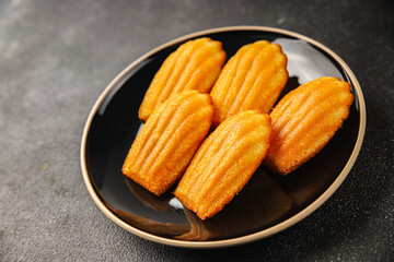 Madeleine, sweet biscuit dessert Christmas cookie delicious Christmas treat Fresh delicious gourmet food background on the table rustic food top view copy space