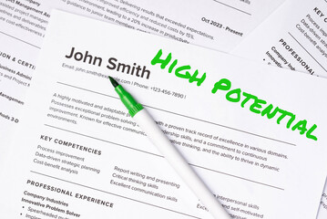 Fake mock CV curriculum vitae) resume for John Smith, selected by HR as perfect candidate for job. Concept of job search, employee selection recruitment process, work and hiring. High Potential