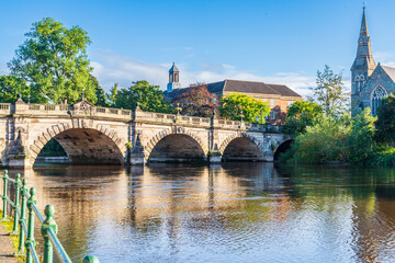 Fototapeta premium English Bridge over the River Severn in Shrewsbury, Shropshire, UK on a summer day