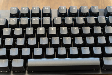 Obraz premium Mechanical keyboard at officre used to work with computer