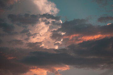 Blue sky with orange clouds during the golden hour.