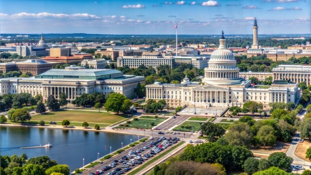 A stunning aerial view of the United States Capitol building in Washington D.C., showcasing its iconic dome and surrounding landmarks on a clear day