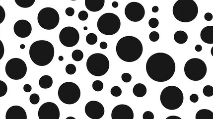 A black and white image of many small black circles. The circles are arranged in a pattern that creates a sense of movement and energy. The image is abstract and dynamic