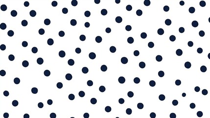 A blue and white polka dot pattern. The pattern is made up of many small blue circles