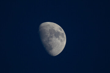  The Moon in evening  time with Blue sky background