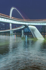 Night lighting of city bridges on the Pearl River in Guangzhou