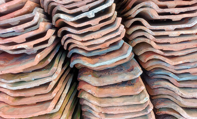 Pieces Of Roof Tiles Arranged Closely Together And Photographed From Above