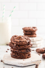 Brownie cookies with flaky sea salt, served with milk for a snack