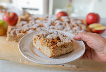 Delicious apple sheet cake with hazelnut crumbles