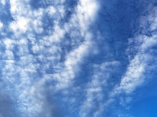 Beautiful view of blue sky with clouds at sunrise. Partly cloudy. Background cloud summer. Cloud summer. Sky cloud clear with sunset.