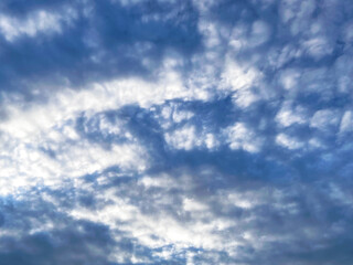 Fototapeta premium Beautiful view of blue sky with clouds at sunrise. Partly cloudy. Background cloud summer. Cloud summer. Sky cloud clear with sunset.