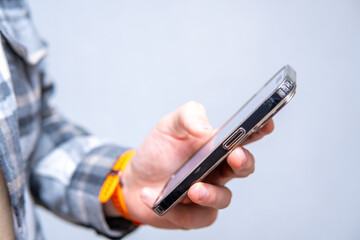  Close-Up of Modern Smartphone Held in Hand