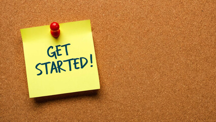 Get started word written on a note sticky on corkboard