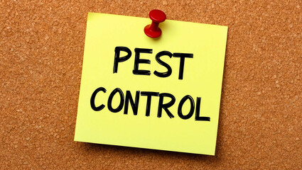 Pest Control word written on a note sticky on corkboard