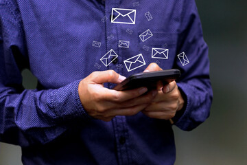 Businessman sending large amount of SMS messages on smartphone, show message box virtual. Bulk messaging, digital online and communication online.