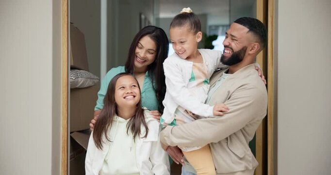 Happy, family and hug in new home with love, support and care together with a smile and parents. Children, house and real estate with dad, mother and kids in a living room with bonding and sibling