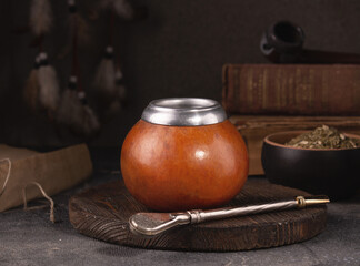 mate tea set against the background of old books, wind music, mock-up