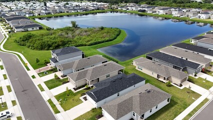 newly built South Florida neighborhood with drainage pond and required wildlife preserve