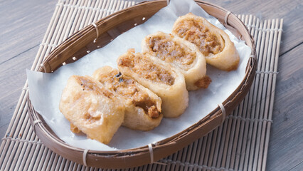 Gohyong is typical chinesse food served with sliced ​​chilies and cuko sauce.