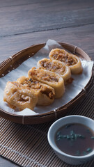 Gohyong is typical chinesse food served with sliced ​​chilies and cuko sauce.