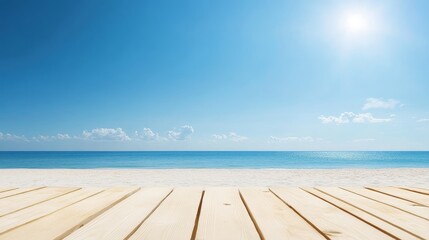 Fototapeta premium A picturesque summer beach scene with a wooden plank in the foreground, perfect for showcasing products, advertising, or creating a relaxing mood. The blue sky, white sand, and sparkling ocean create 