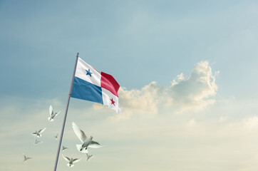 Panama flag waving with flying doves in beautiful sky. Panama flag for Republic Day and Independence Day.