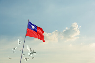 Taiwan flag waving with flying doves in beautiful sky. Taiwan flag for Republic Day and Independence Day.