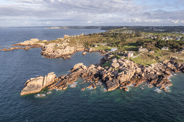 Aerial view of Ploumanac'h Lighthouse, Pink Granite Coast seascape in Brittany, France