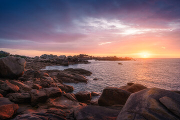 Sunset landscapes at the coastline of the Pink Granite Coast in Brittany, France