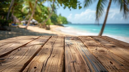 Fototapeta premium Empty wooden table on blur background of beautiful beach for mockup summer product display or travel ad. Picnic table with customizable space on table-top for editing. 