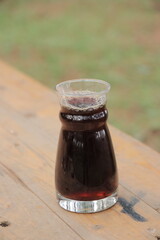 Original black coffee in a glass