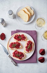 Beet ricotta bruschetta in a plate