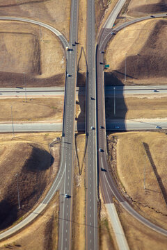 Above view of a freeways and roads near Denver airport. The roads are E-470 and Pena Blvd.