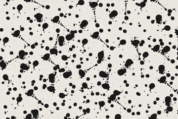 Black and beige abstract background with splashes and blots